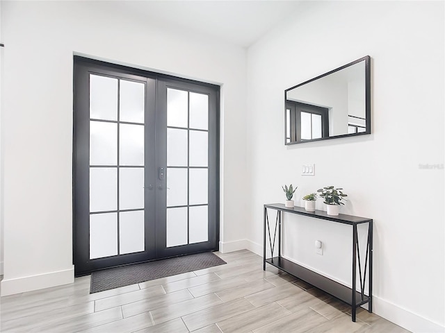 entryway featuring french doors