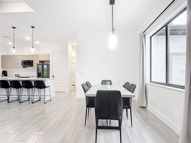 dining space with a wealth of natural light