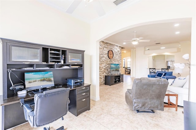 tiled office space featuring ceiling fan