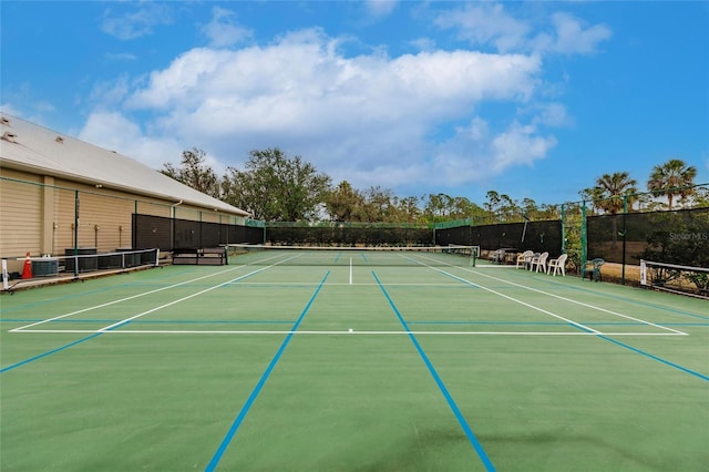 view of sport court featuring basketball hoop