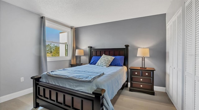 bedroom featuring a textured ceiling