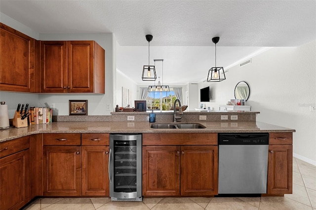 kitchen featuring stone countertops, pendant lighting, sink, wine cooler, and stainless steel dishwasher