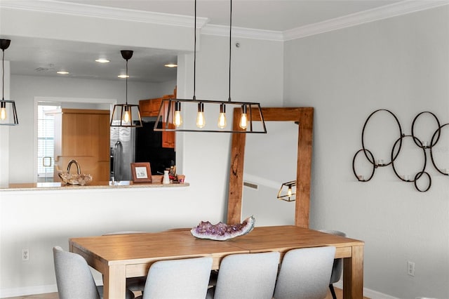 dining room with ornamental molding