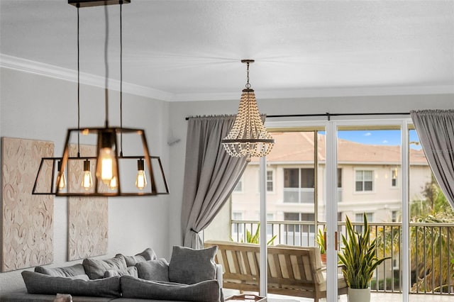 interior space featuring crown molding, a notable chandelier, and a wealth of natural light