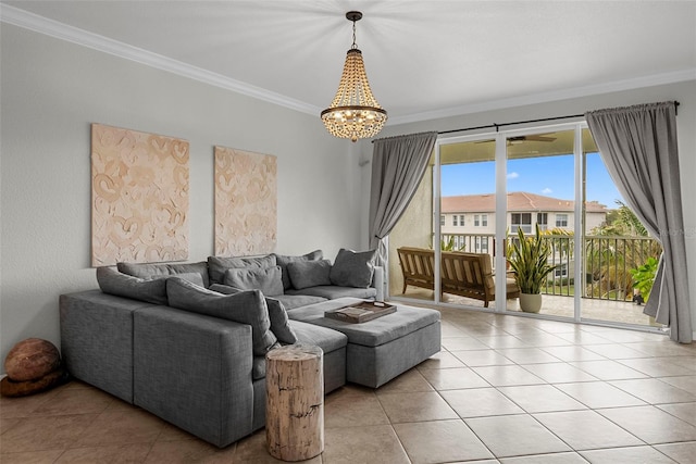 living room with a notable chandelier, tile patterned floors, and ornamental molding