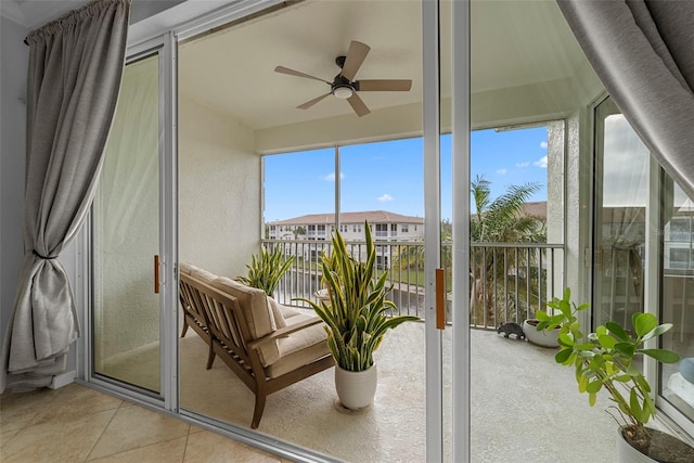 sunroom / solarium with ceiling fan