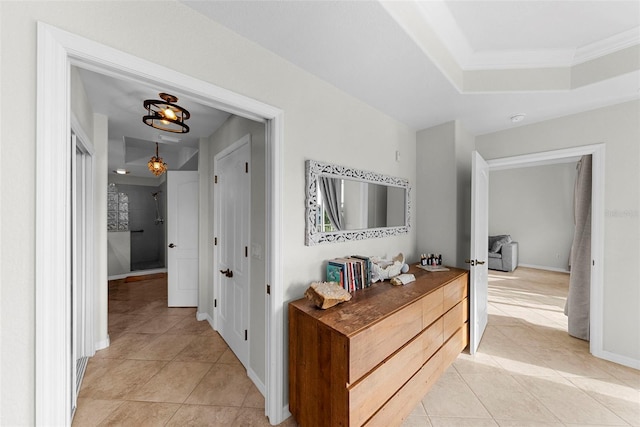 corridor featuring light tile patterned floors