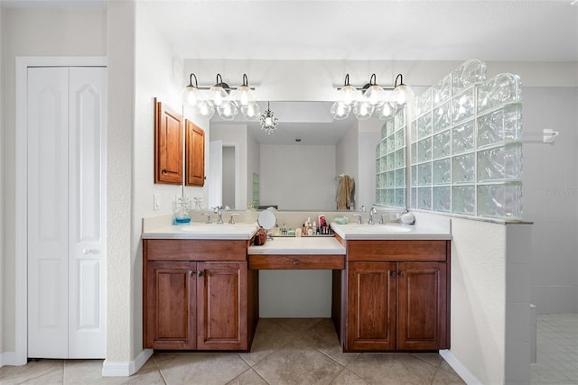 bathroom with vanity, tile patterned floors, and walk in shower