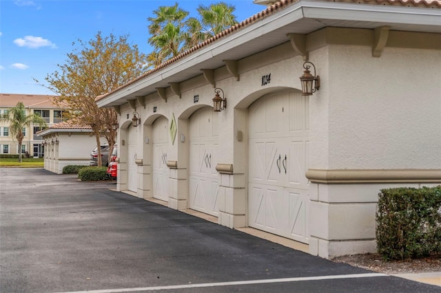 exterior space with a garage