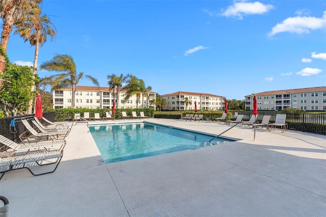 view of swimming pool with a patio