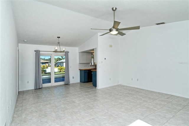 unfurnished living room featuring ceiling fan with notable chandelier and lofted ceiling