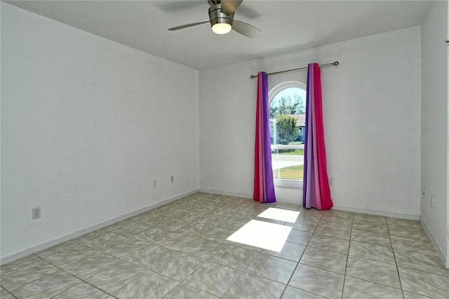 unfurnished room with ceiling fan