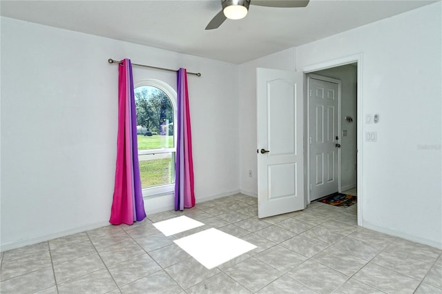 unfurnished room featuring ceiling fan