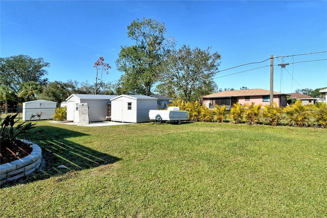 view of yard with a shed