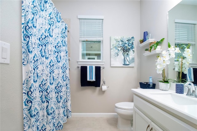 bathroom with tile patterned flooring, vanity, a shower with curtain, plenty of natural light, and toilet