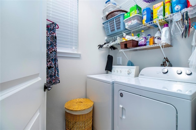 laundry area with separate washer and dryer