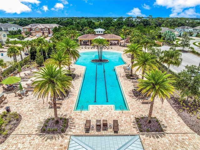 view of swimming pool featuring a patio