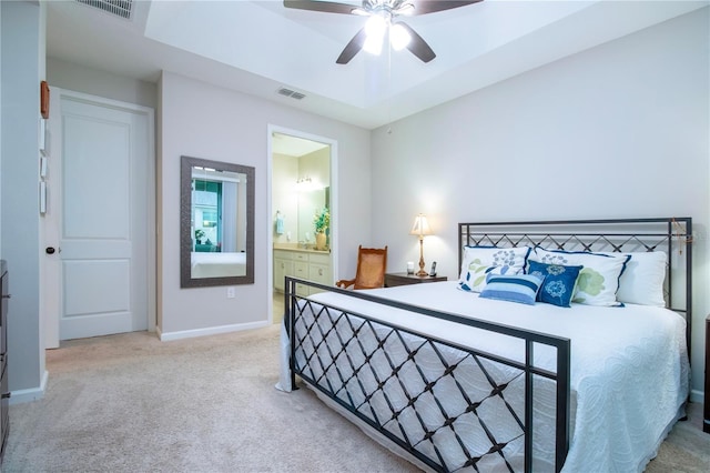 11728 Meadowgate Pl, Bradenton, FL 34211 - carpeted bedroom featuring baseboards and ensuite bath