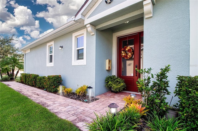 11728 Meadowgate Pl, Bradenton, FL 34211 - doorway to property with stucco siding