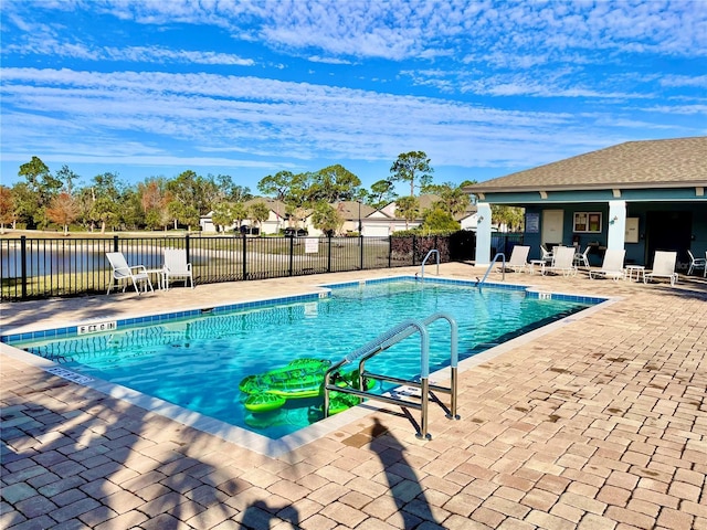 view of swimming pool with a patio area