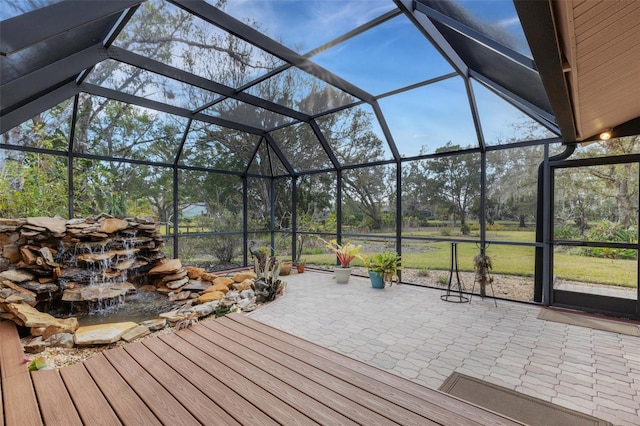 deck featuring a lanai and a patio area