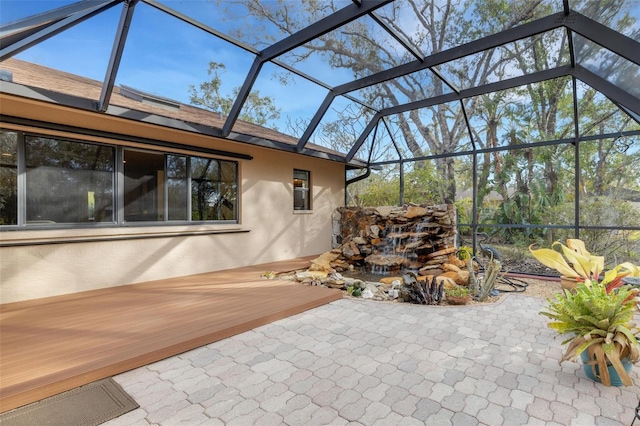 view of patio with a lanai