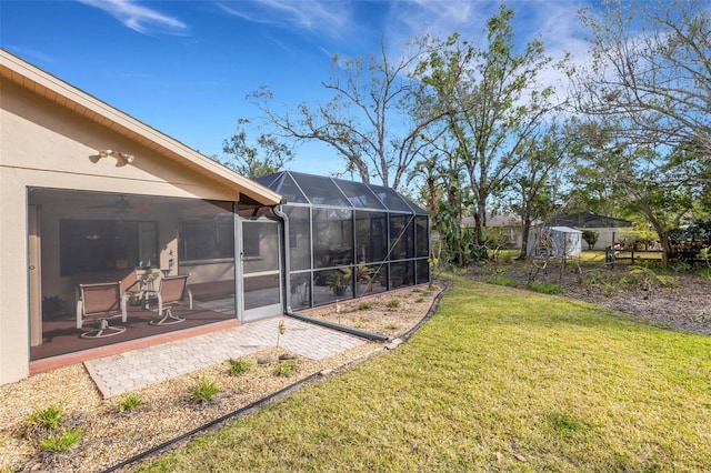 view of yard with a sunroom