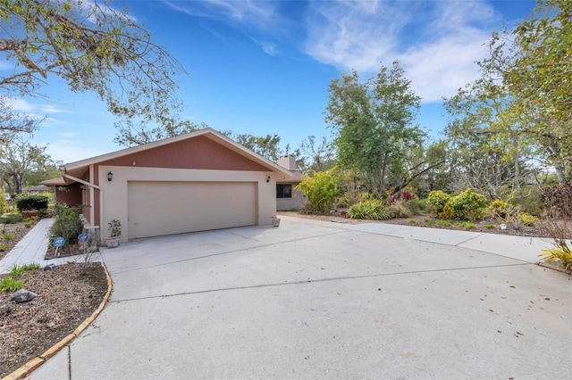 view of property exterior featuring a garage