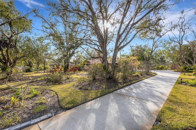 surrounding community featuring a lawn