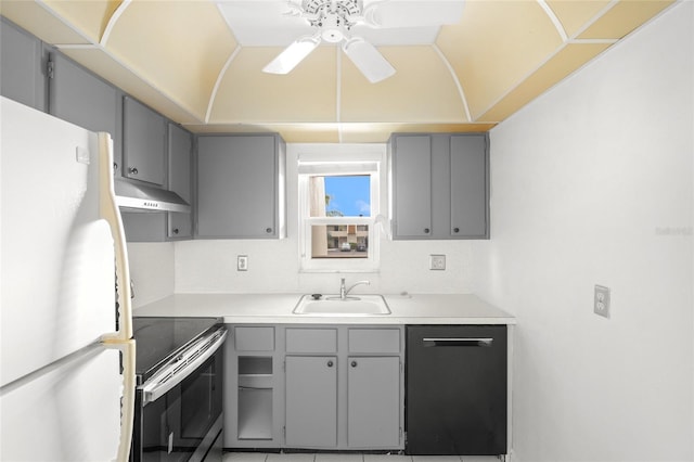 kitchen featuring electric stove, black dishwasher, white fridge, sink, and gray cabinets