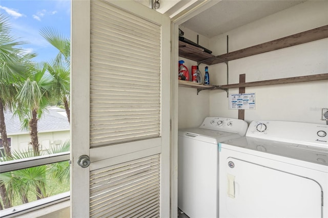 laundry room with independent washer and dryer