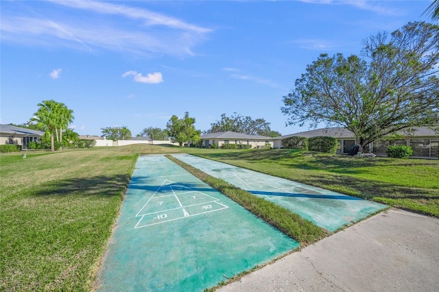 surrounding community featuring a yard