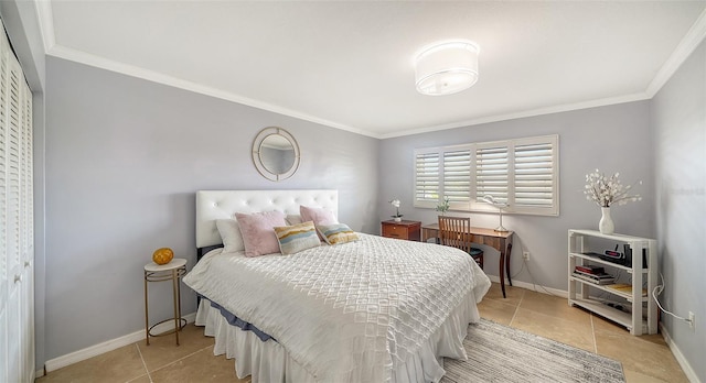 bedroom featuring light tile patterned floors, baseboards, and crown molding