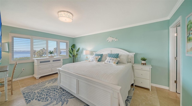 bedroom with light tile patterned flooring and crown molding