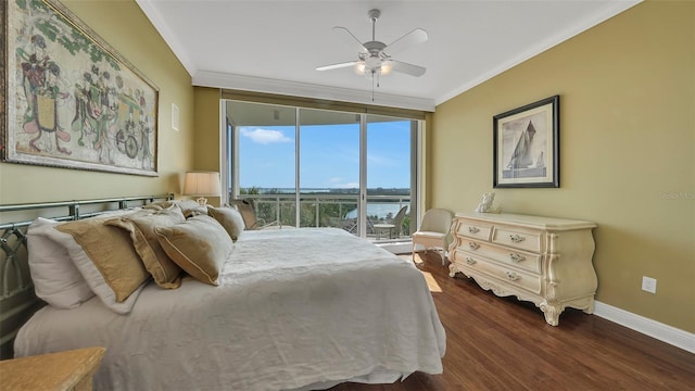 bedroom with a wall of windows, dark hardwood / wood-style flooring, a water view, ceiling fan, and crown molding