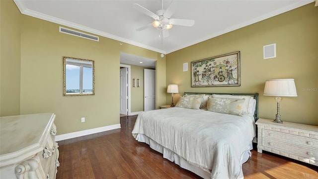 bedroom with ceiling fan, dark wood-type flooring, and ornamental molding