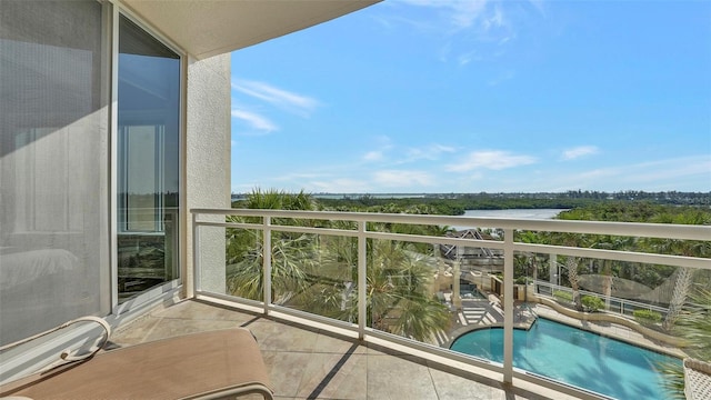 balcony featuring a water view