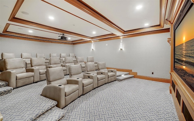 carpeted cinema featuring beam ceiling and crown molding