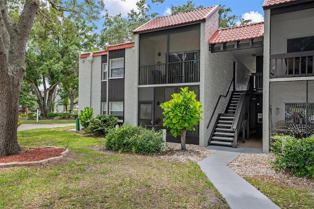 view of property with stairs