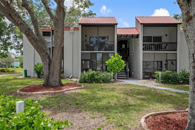 view of property with stairs