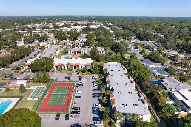 birds eye view of property with a residential view