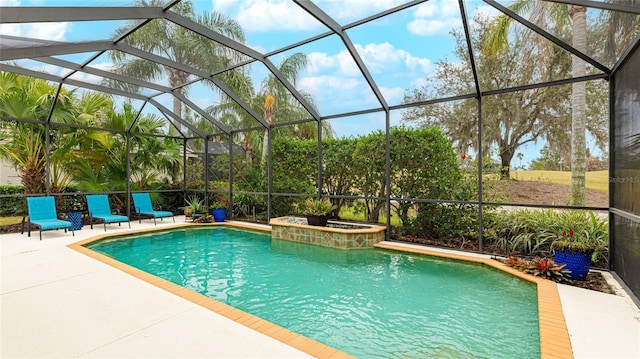7244 Orchid Island Pl, Bradenton, FL 34202 - view of pool featuring a patio area, glass enclosure, and a pool with connected hot tub