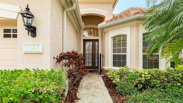 7244 Orchid Island Pl, Bradenton, FL 34202 - property entrance featuring stucco siding
