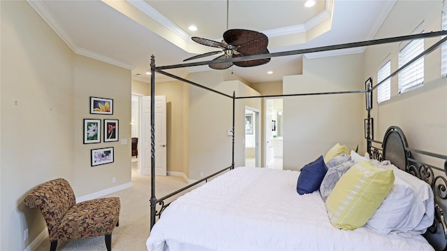 7244 Orchid Island Pl, Bradenton, FL 34202 - bedroom with ornamental molding, light colored carpet, recessed lighting, connected bathroom, and a raised ceiling