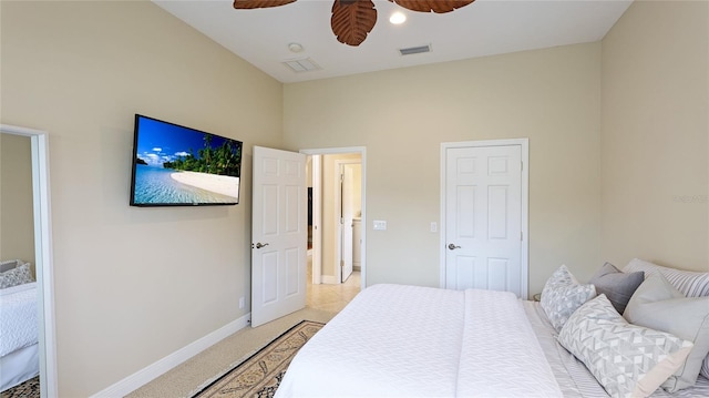 7244 Orchid Island Pl, Bradenton, FL 34202 - bedroom with light colored carpet and a ceiling fan