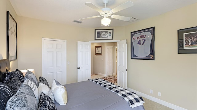 7244 Orchid Island Pl, Bradenton, FL 34202 - carpeted bedroom with ceiling fan and a closet