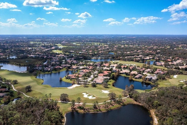 7244 Orchid Island Pl, Bradenton, FL 34202 - aerial perspective of suburban area with a local golf course and a large body of water
