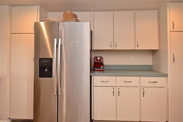 kitchen featuring stainless steel fridge