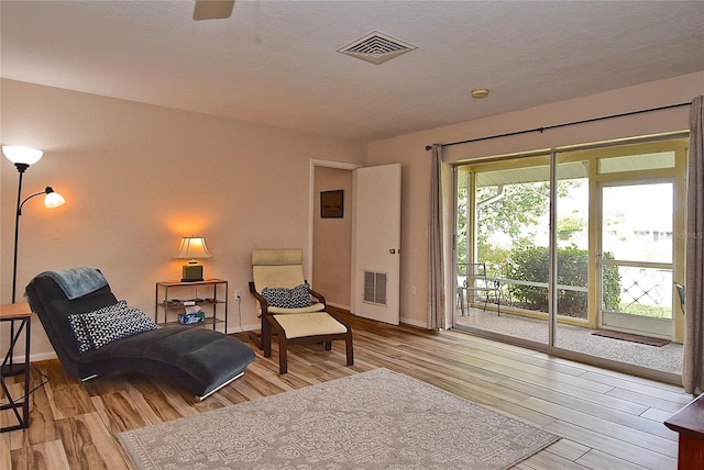 living area with light wood-type flooring