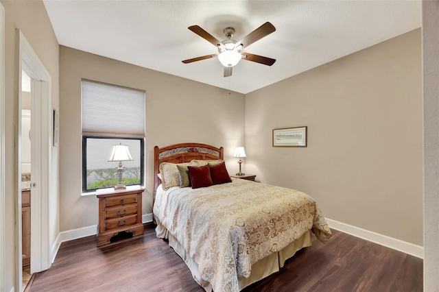 bedroom featuring dark hardwood / wood-style floors and ceiling fan